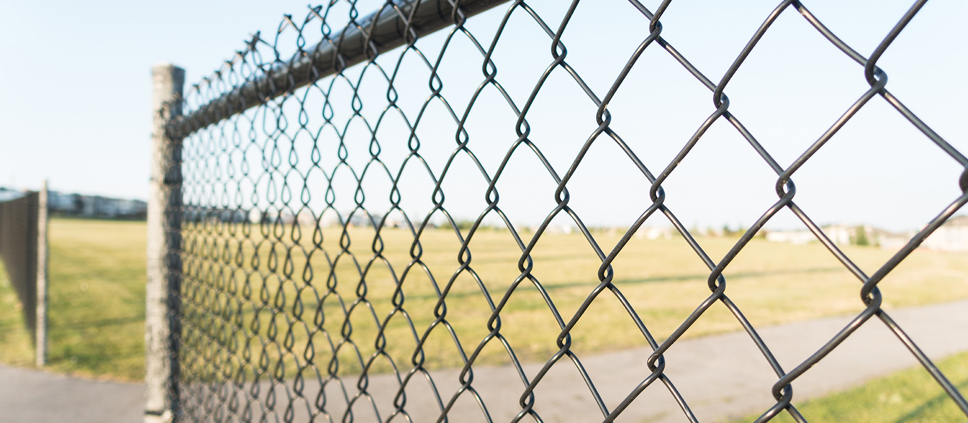 Chain link fence installation in progress